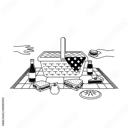 Picnic Basket with Food and Drinks on a Blanket.