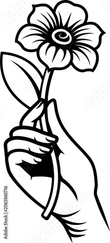 A hand holding a flower des...