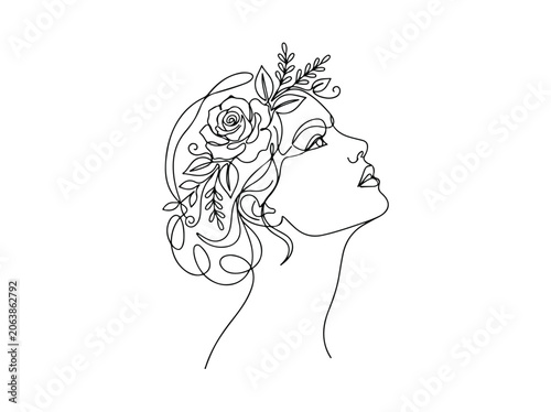 Woman with floral hair decoration.