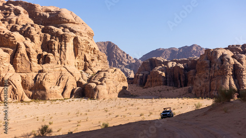 Картината върху платно Off-road vehicle exploring the red desert of Wadi Rum, Jordan