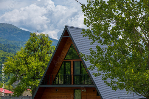 Modern A-frame cabin in the mountains