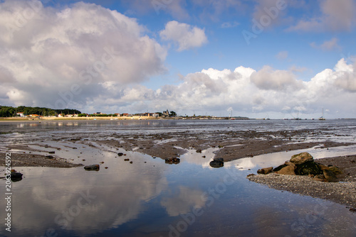 Low Tide Coastal Mudflats and Seaside Village With Cloud Reflections, Fouras, France