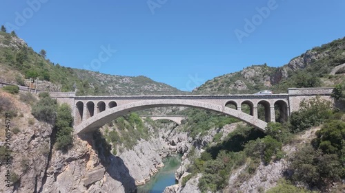 Pont du Diable Bridge Spanning Verdant Gorge in Occitanie, France