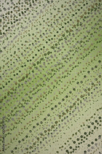 Green and brown camouflage dot pattern on grid