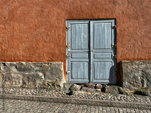 Old Timeworn Wooden Door of Entrance to House on Medieval Street of Porvoo (Borgå) in Finland. Architectural Detail.