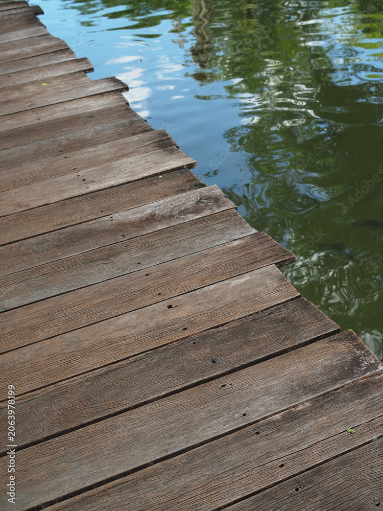 Fototapeta premium Close up of weathered wooden bridge