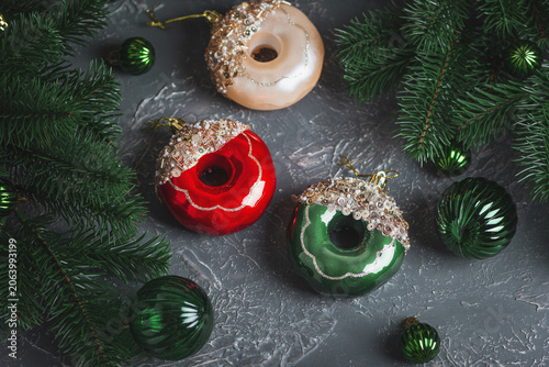 Festive donut Christmas ornaments with spruce branches