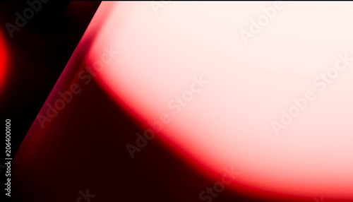 Abstract vivid red and black gradient with smooth curves and soft lighting effects.