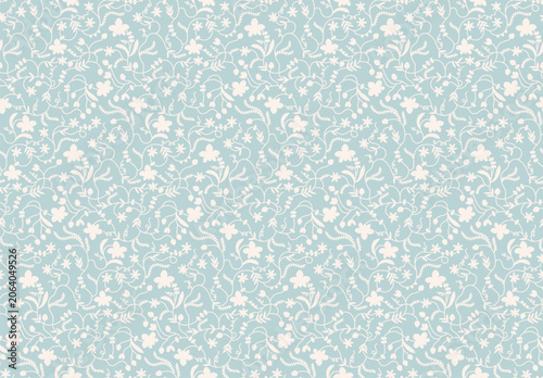 Seamless vintage floral pattern with delicate white vines and blossoms on a soft light blue background. Romantic folk art design for textile, fabric, wallpaper, wrapping paper spring decor