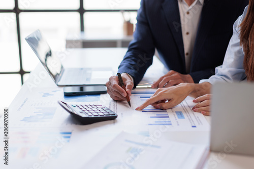 Hands and graphs on tablet screen for finance results, profit growth and budget review. Staff, team and digital with financial report, revenue stats and dividend comparison of risk assessment