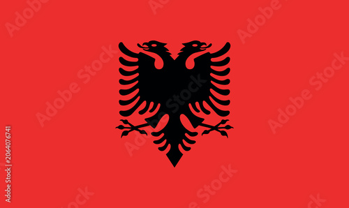 Fotografía Albania flag featuring a red field with a black double-headed eagle in the center, symbolizing strength, freedom, and national heritage