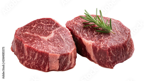 Fotografi Two raw beef steaks with rosemary sprig