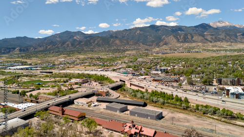 Foto Aerial panorama of Colorado Springs railroad tracks and depot with Pikes Peak an