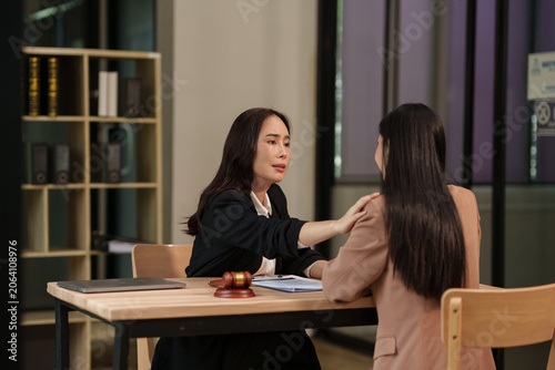 Professional Female Lawyer Providing Legal Advice and Consultation to Client in Office