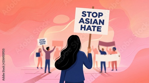 Woman holding protest sign Stop Asian Hate with diverse crowd in background.