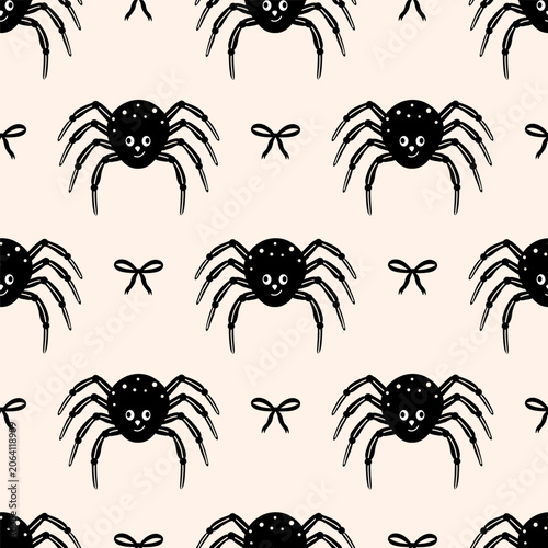 Seamless Halloween pattern with spiders and black bows.