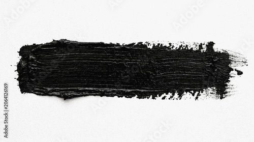 Robust horizontal black paint stroke featuring pronounced dry brush li