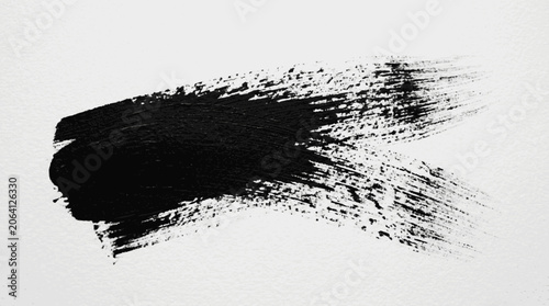Broad diagonal black dry brush stroke with a solid rounded beginning a