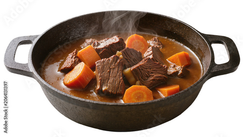 Foto Hearty beef stew with carrots in cast iron pot