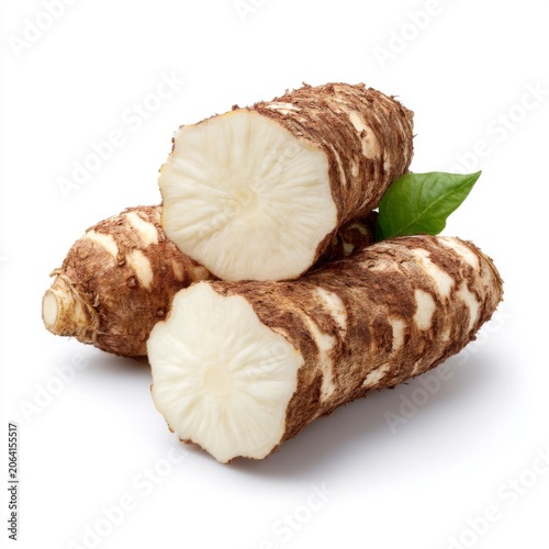 Fresh Raw Horseradish Roots on White Background with Green Leaf Accents for Culinary Use and Recipe Ideas