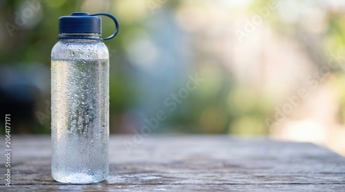 Refreshing condensation on a cold water bottle
