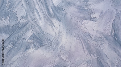 Silver silk Venetian plaster with a matte texture for the walls.