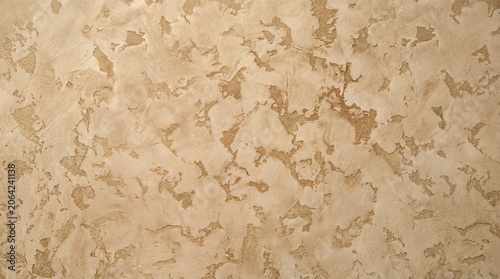 Golden plaster with the texture of the walls is based on a warm beige cream with organic inclusions of metallic golden-bronze shimmer.