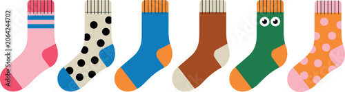 Set of colorful patterned socks with various designs including polka dots, stripes, and cute character faces for fashion