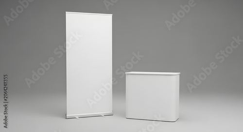 Blank white roll up banner and counter stand for advertising and promotions on a neutral background, ready for custom branding.