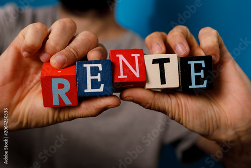 Person holding alphabet blo...