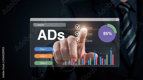 A digital hand touching a screen with marketing ads statistics and data charts