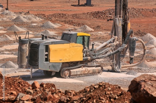 Photography the drilling rig drills boreholes for blasting and mining