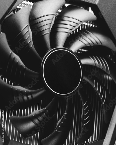 Slika na platnu Computer cooling fan blades and heatsink fins in monochrome