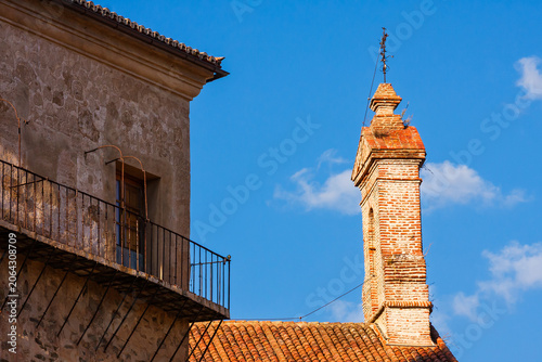 Old Brick Chimney and Balcony under Blue Sky in Guadalupe