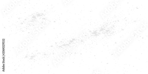 Fotografie Abstract Dust Particles: A scattered collection of small, ethereal dust particles floating against a stark white background, suggesting a sense of airiness and subtle motion