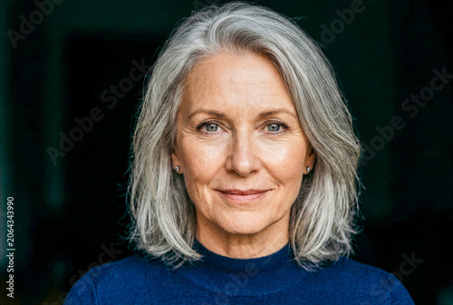 Elegant Mature Woman with Silver Hair and Serene Expression in Portrait