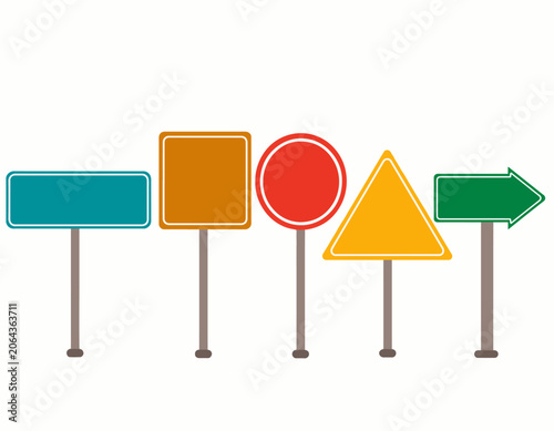 A set of five blank road signs on poles