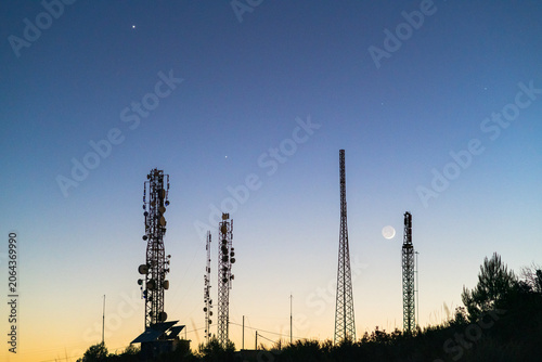 Nightscape photography of telecommunication towers with Moon, Jupiter and Venus alignment