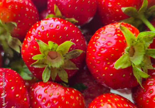 Vászonkép Texture macro of ripe garden strawberries