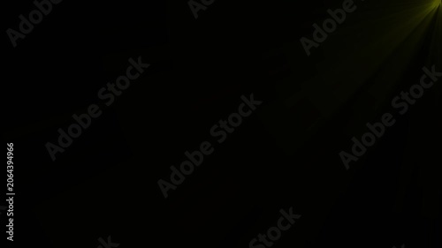 Abstract golden light rays overlay effect on black background, for cinematic transitions, glow