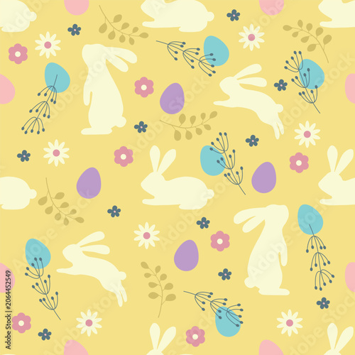 Cute Easter seamless pattern with rabbits, colorful eggs and spring flowers on a pastel yellow background. Perfect for kids fabric, wrapping paper, nursery decor, textile prints and holiday designs.