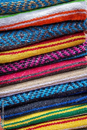 Bild auf Leinwand Colorful striped woollen rugs selling on the street
