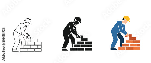 Three construction workers building brick walls with different colored bricks