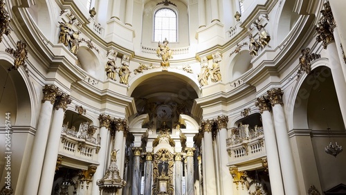 Interior view of a beautiful church showcasing ornate architecture, high ceilings and detailed decorations. Sacred space emphasizing the atmosphere of peace, spirituality and historical character