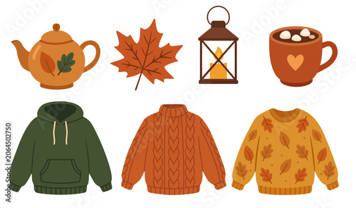 Various Autumn Items Such as Tea Pot, Leaf, Lantern, Mug and Sweaters Arrange...