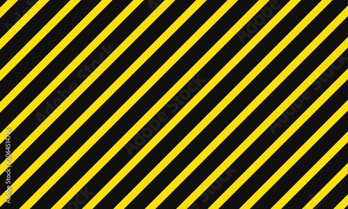 Yellow and black hazard stripes on a grungy metal warning background