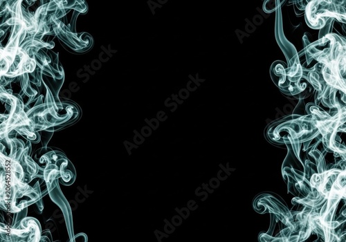 Wispy white smoke swirls against a deep black background with copy space for design