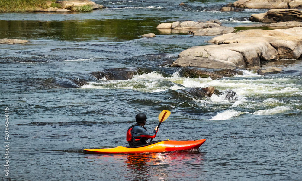 Naklejka premium kayaking in the river
