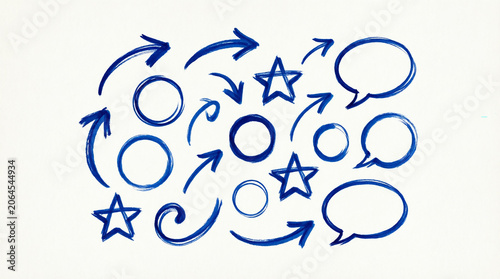 Set of artistic hand drawn circles arrows speech bubbles and star shapes.