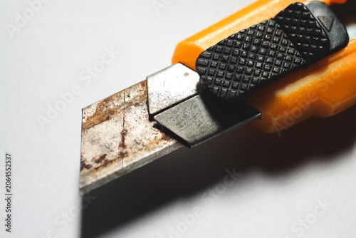 Cuadro en lienzo A close-up view of a knife lying on a table, ready for use